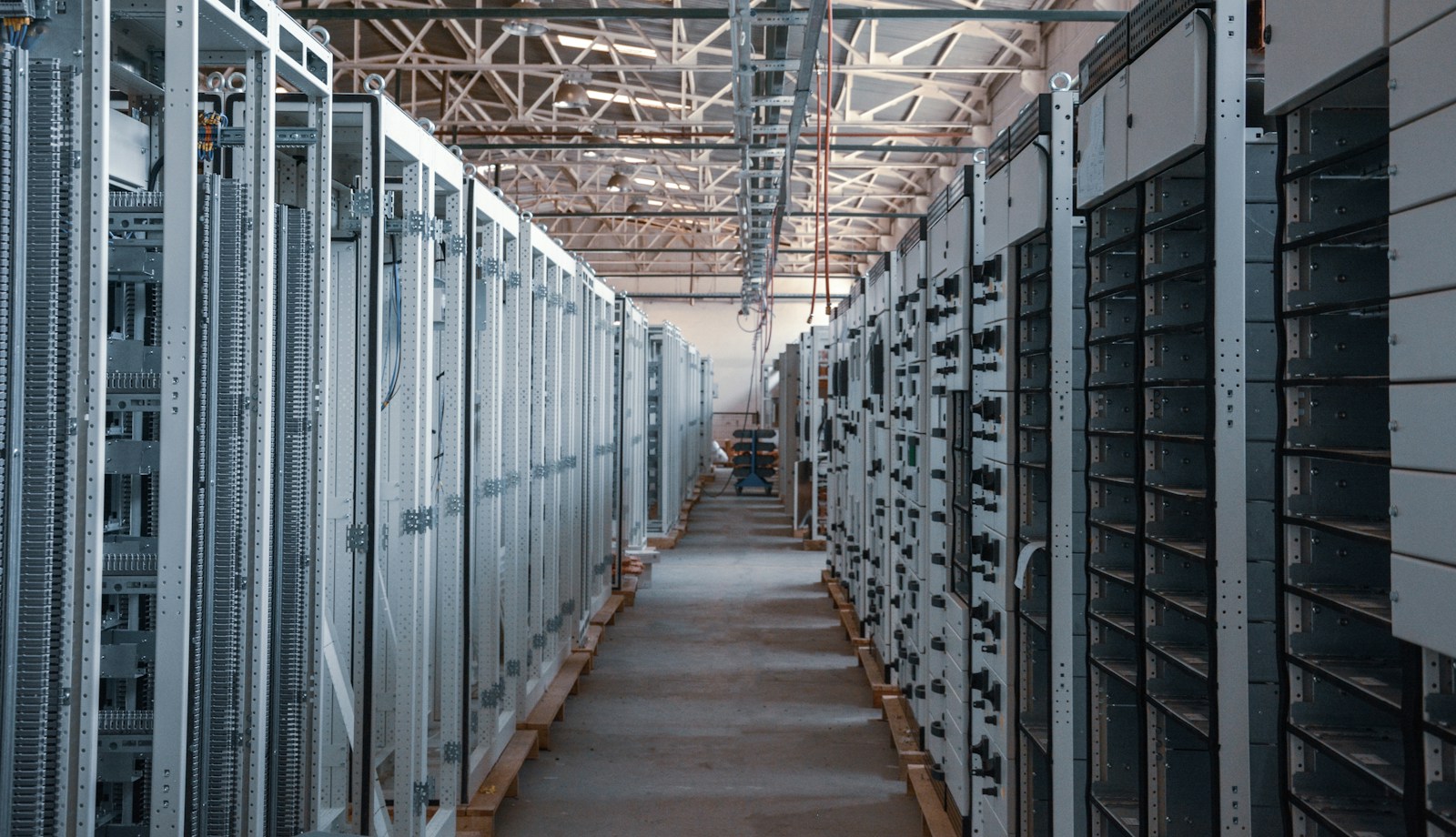 Server racks in a modern data center operations facility